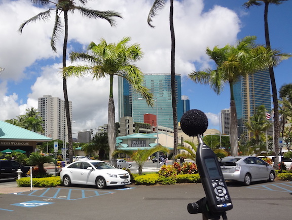 an image of acoustic testing equipment outside near a busy plaza