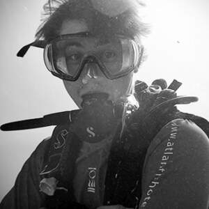 a photo of Liam scuba diving underwater. 
