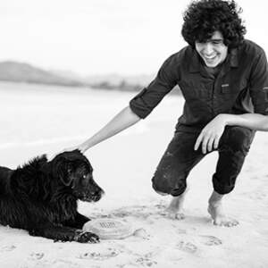 a photo of Max on the beach with Todd's dog, Echo.