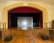 a photo of the stage at the newly renovated Bachelot Hall courtesy of MASON Architecture.