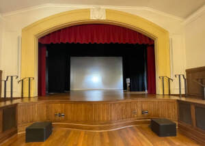 a photo of the stage at the newly renovated Bachelot Hall courtesy of MASON Architecture.